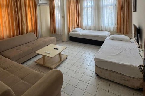 Damlataş Elegant Apart Otel Tek Yatak Odası Damlataş Elegant Apart Otel tek yataklı oda – rahat ve ferah konaklama alanı
